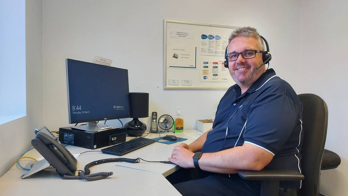 SUPPORT: Lifeline Hunter CEO Rob Sams on the Lifeline phones. Picture supplied