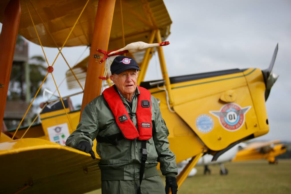 World War II Lancaster Bomber pilot Bill Purdy - then aged 91 - next to a Tiger Moth before an event in NSW in 2014. ACM file picture/Peter Stoop