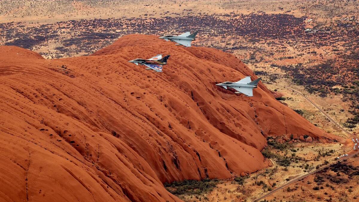 German Eurofighters flying over Uluru. Picture via Luftwaffe, Christian Timmig, Bundeswehr.
