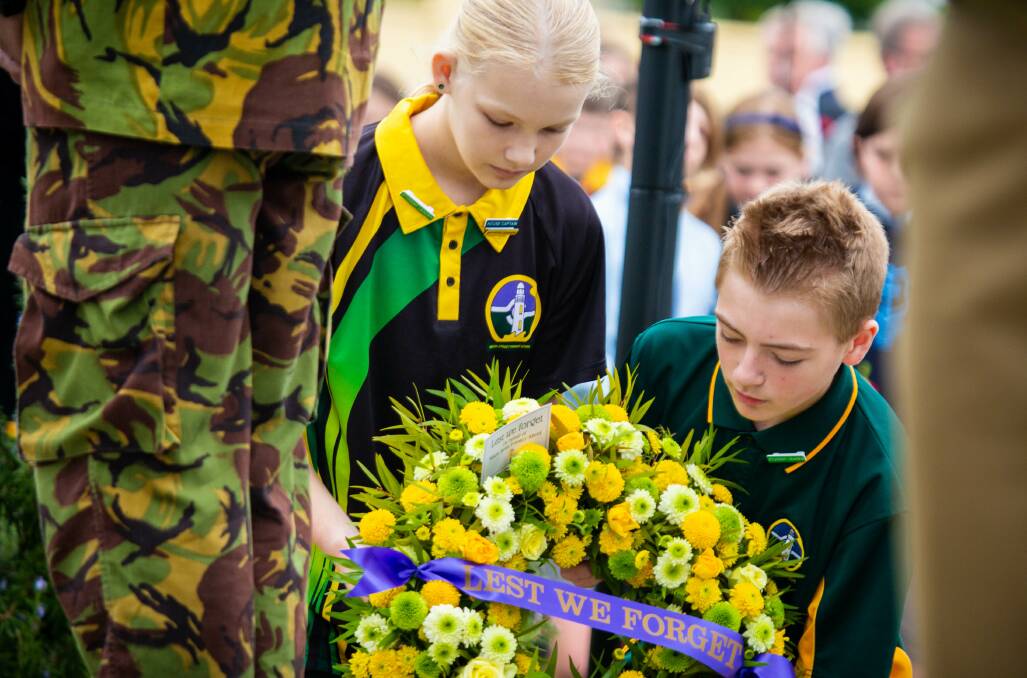 Nixon Street students laying a wreath at the Devonport Anzac Day Service in 2022. Picture by Eve Woodhouse. 