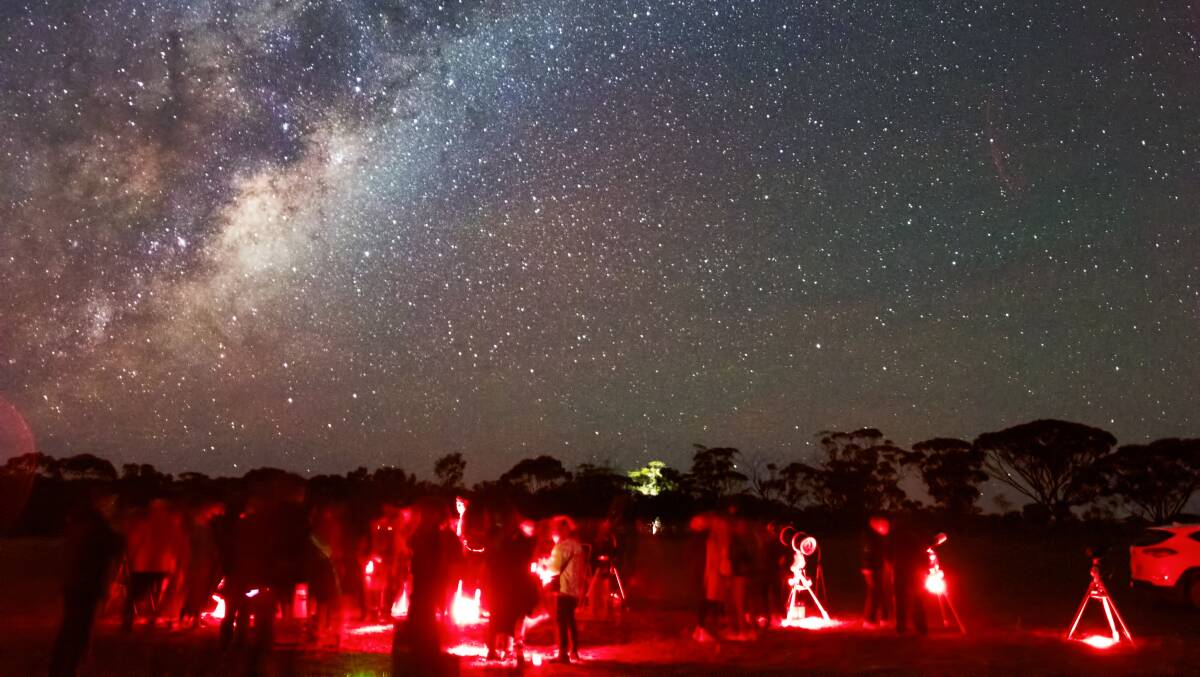 Star gazers under the milky way in Western Australia. Picture by Carol Redford.