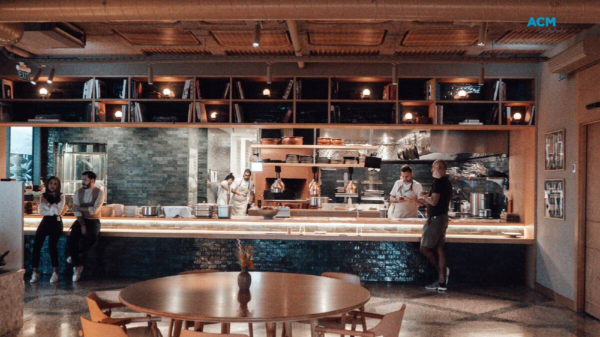 Calm before the storm, a restaurant preparing for service (photo credit: canva)
