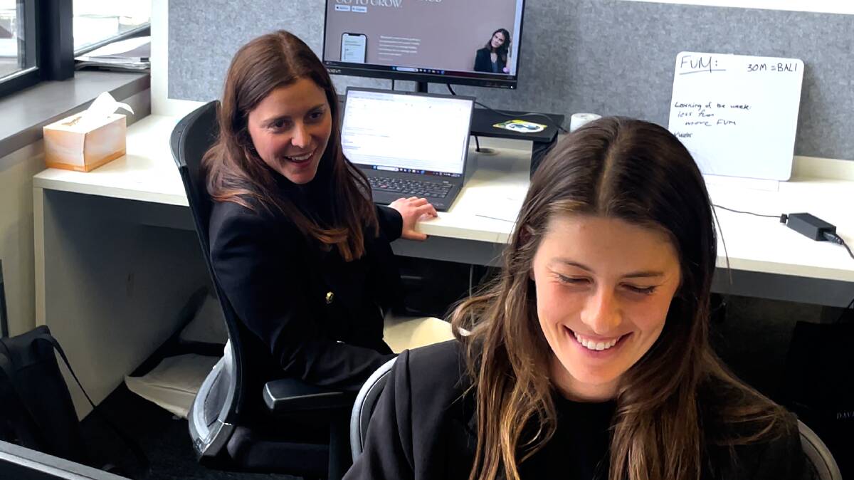 Gaby (left) and Ali Rosenberg work side by side in Blossom's Sydney office. Picture by by Cameron Forrester