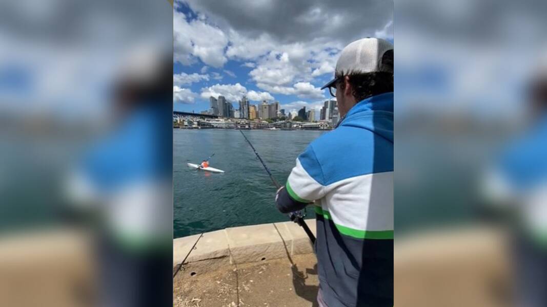 Footage from a TikTok video shows the fisherman reeling in an angry kayaker. File picture.