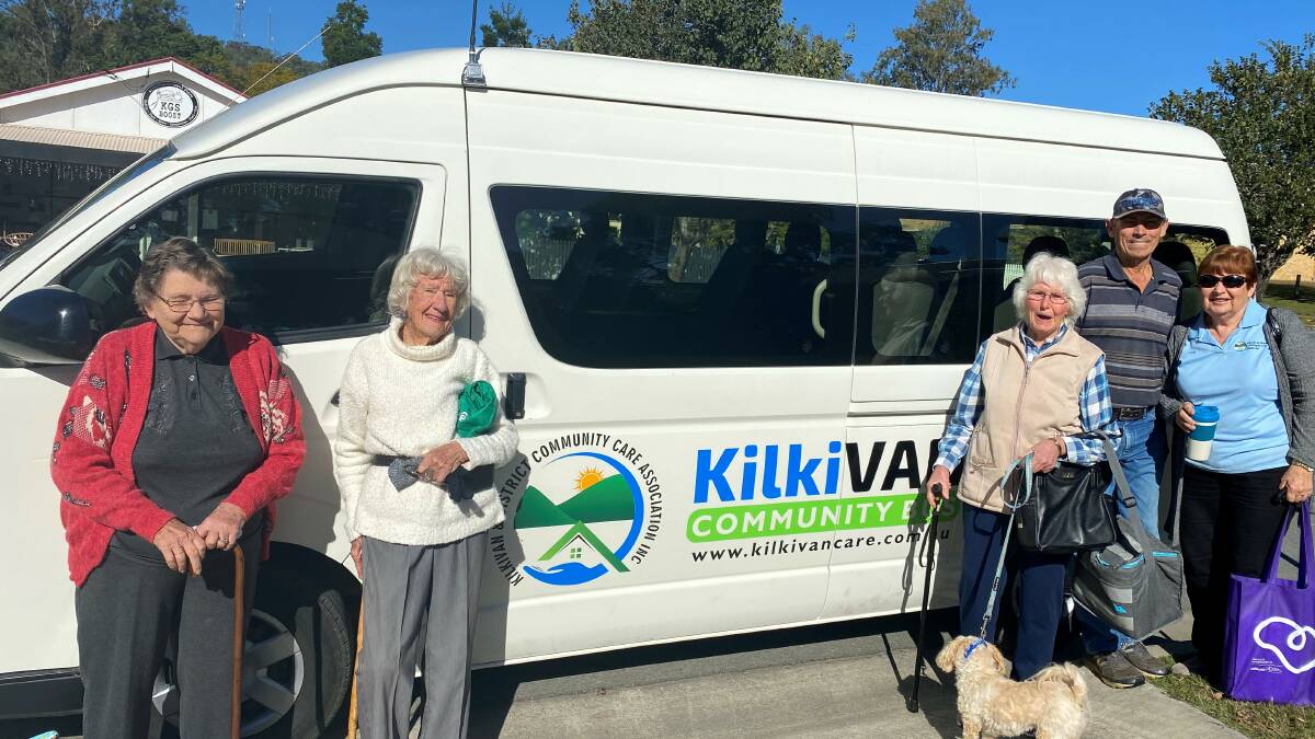 Locals stand in front of the KilkiVan community bus. Picture by Kilkivan District Community Care Group
