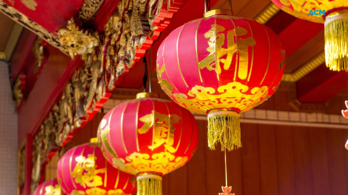 A close up of gold and red lanterns in the daytime. File picture.