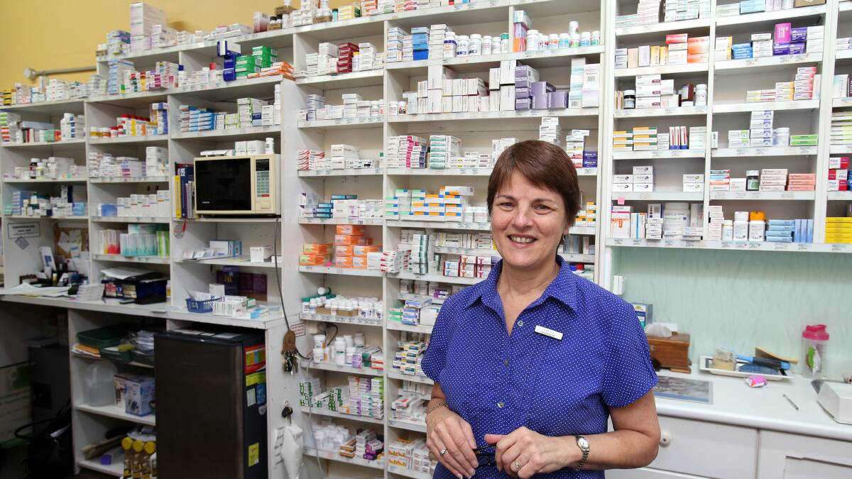 Pharmacist Katerina Novarina in her Thirroul Chemist in 2015. Photo by Kirk Gilmour