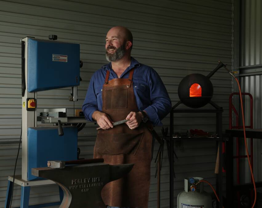 Craftsman by night: Bladesmith Craig Maher in his Branxton shed.