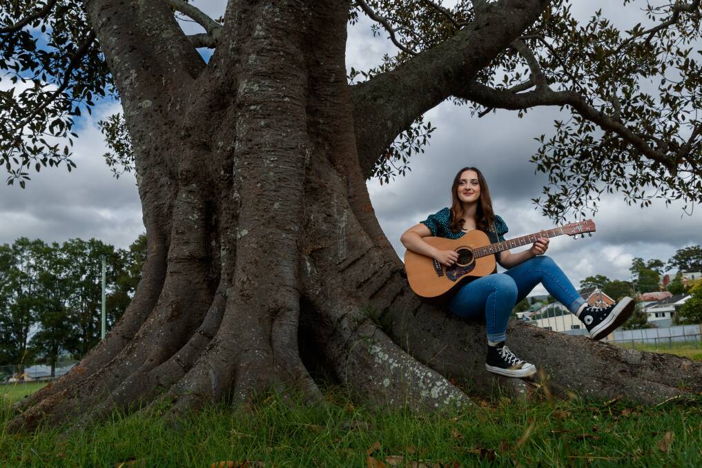 West Wallsend songwriter and blues singer Piper Butcher at Wallace Park this week. Picture by Max Mason-Hubers