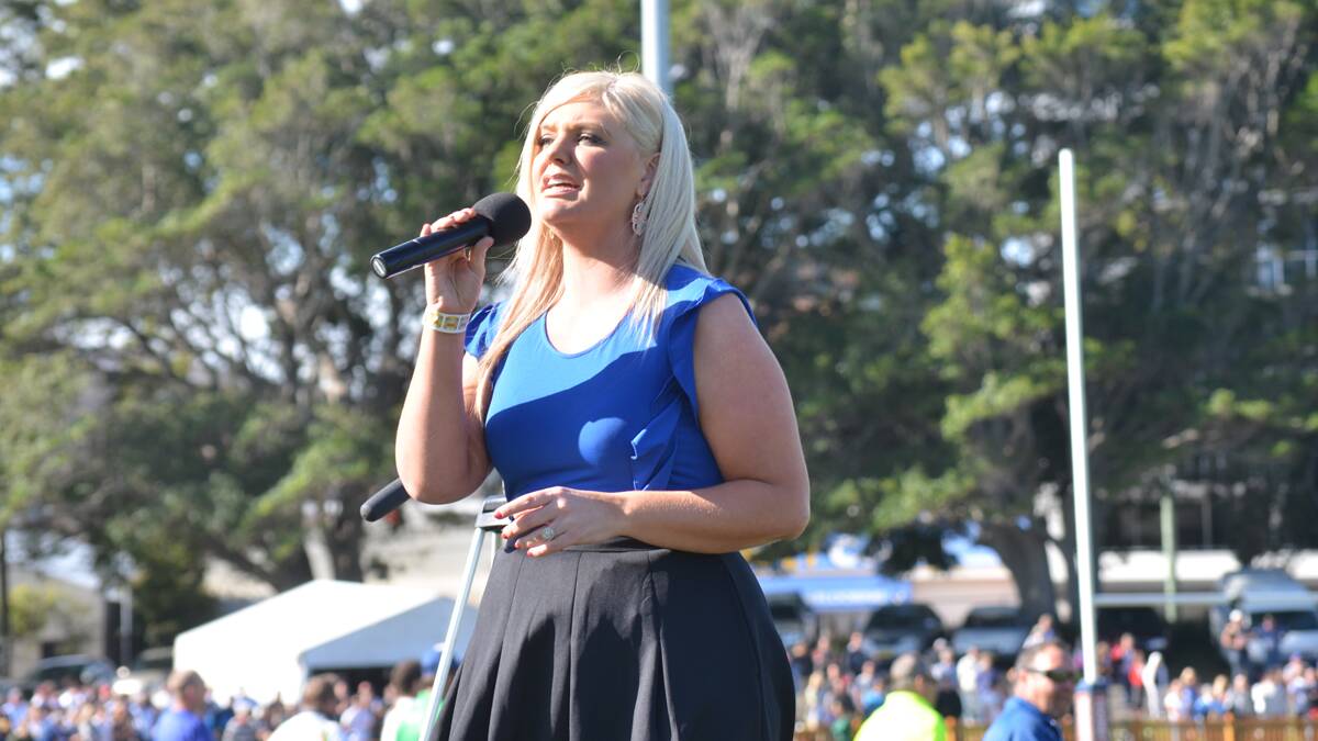 VOICE: Amanda Barrass sings the national anthem at the 2014 Newcastle Rugby League grand final. Picture: Krystal Sellars