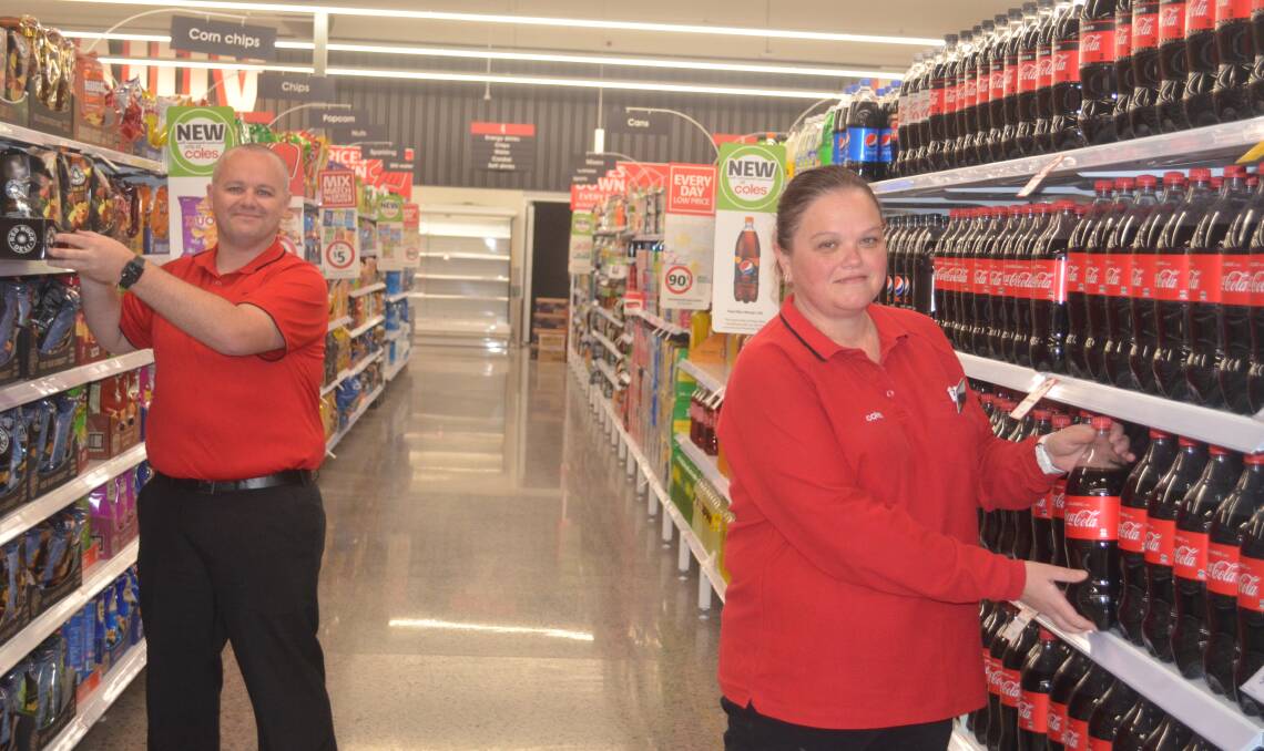 BIG WEEK AHEAD: Coles Huntlee store manager Tim Hill and store support manager Lisa Brooks, preparing for the store's September 16 opening.