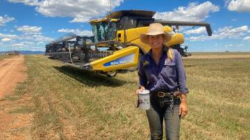 Molly Wright takes a break from the header during the 2022 harvest, Peak Hill. Picture supplied