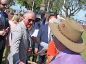 A weirdly cool future King shakes the hand of a fan in Darwin back in 2018.