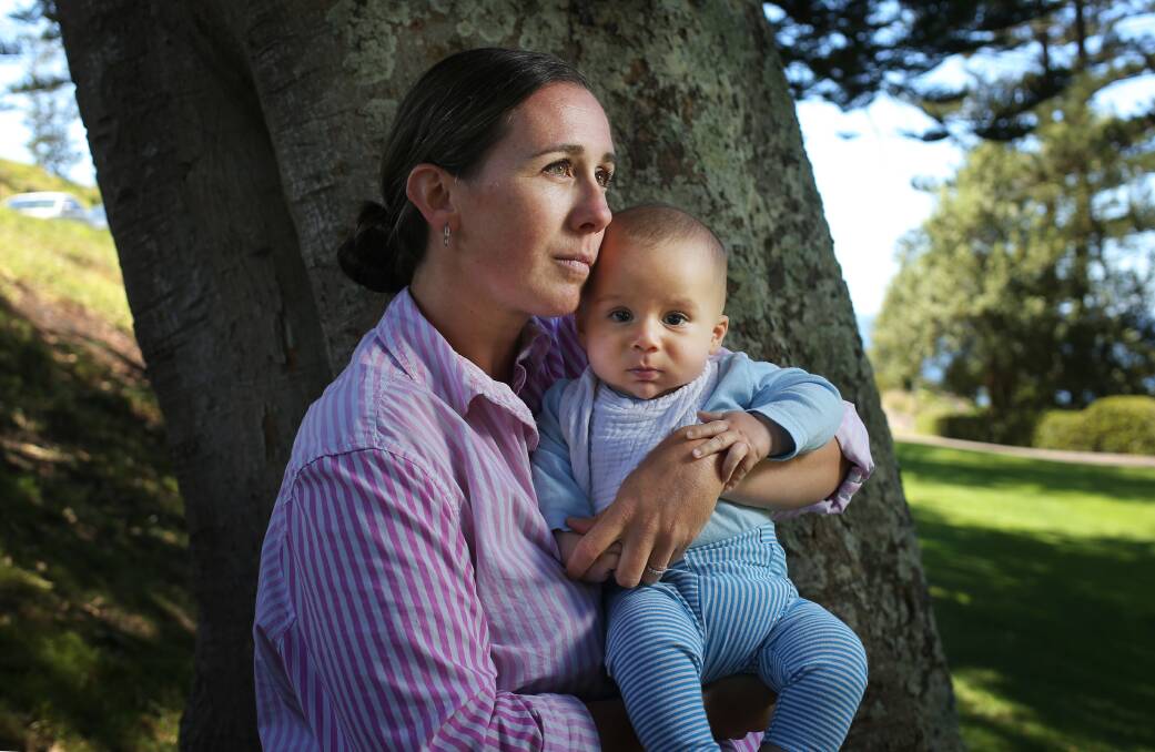 Brittany West with son Josiah in Newcastle. Her parents are caught in Tel Aviv, Israel, during the war. Picture by Simone De Peak 
