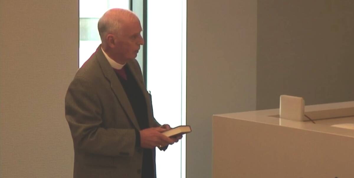 HISTORICAL EVENTS: Bishop Richard Appleby, a former assistant bishop in the Newcastle diocese to Bishop Alfred Holland, takes the oath before giving evidence to the royal commission on Thursday.