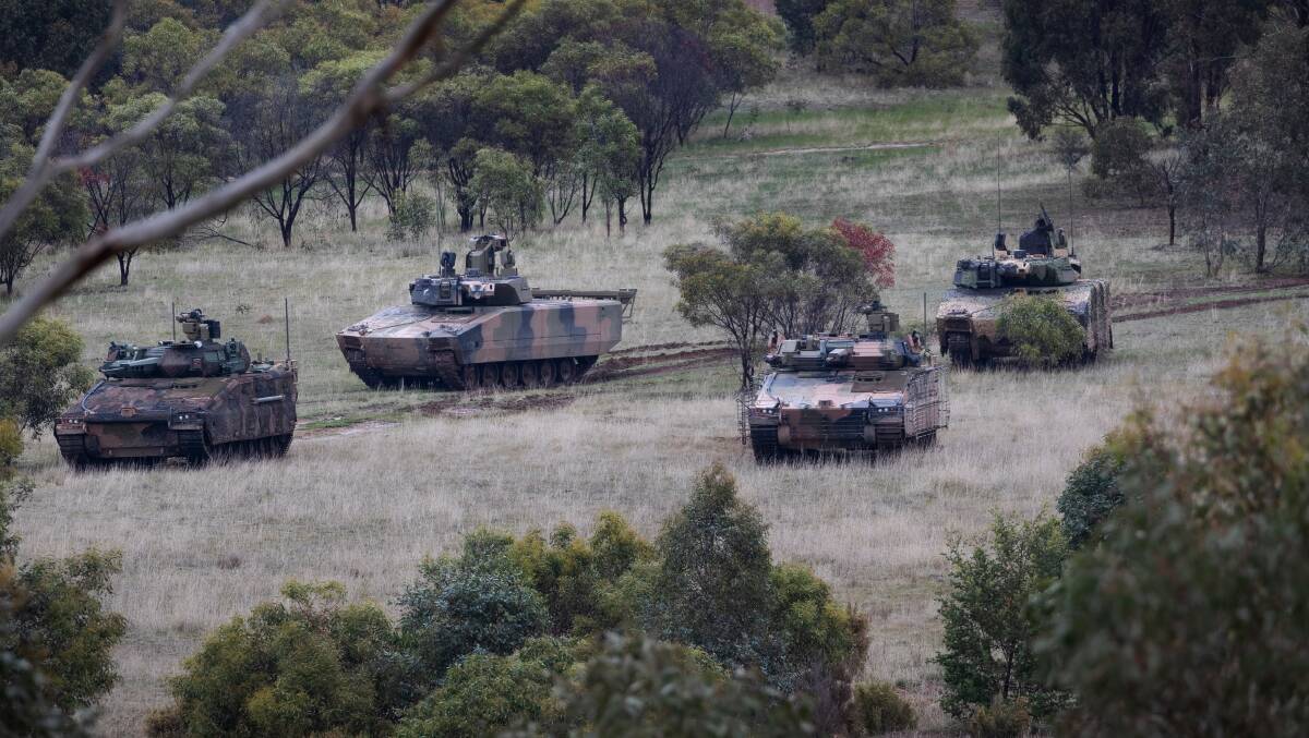 Hanwha Redback infantry fighting vehicles, front, and Rheinmetall LYNX KF41 Infantry Fighting Vehicle, back, during LAND 400 Phase 3 user evaluation trials at Puckapunyal. Picture Defence