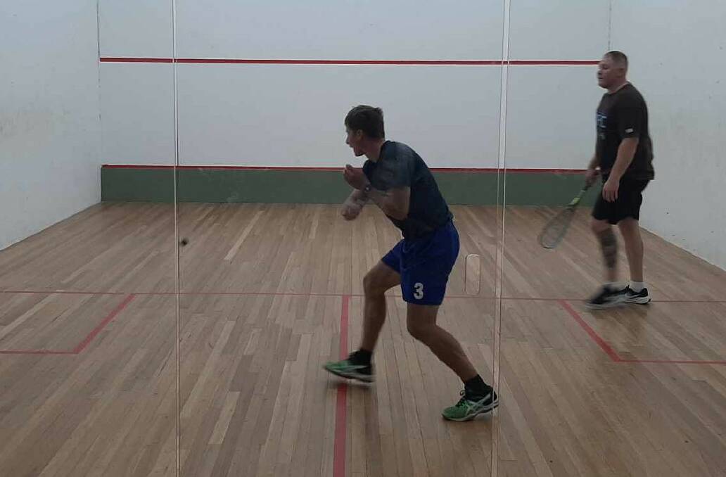 Jakub Vitek looks to hit the backhand winner while Mick McMorrow calculates how far he has to run. Picture supplied
