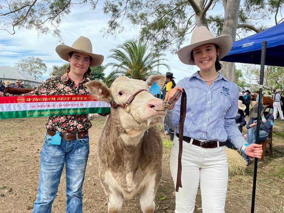 Harriett Shields and Isabel de Jager from St Paul's College with the reserve champion led light middle weight champion. Photo: Samantha Townsend