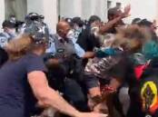 Police and protesters clash at Parliament House on Thursday morning. Picture: Instagram