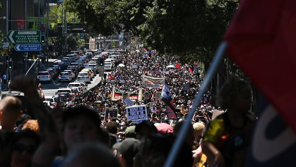 Thousands march during an Invasion Day protest in Sydney on Australia Day. Picture Getty Images