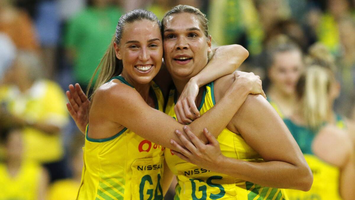 Donnell Wallam, right, was supported by her Australian netball teammates after taking a stand against Netball Australia's sponsorship deal with Hancock Prospecting. Picture AAP