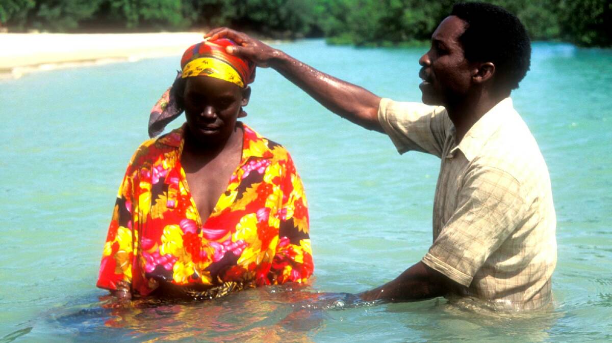 Pentecostal baptism in the Indian Ocean, Zanzibar. Photo by Christine Osborne from her book, Among Believers.