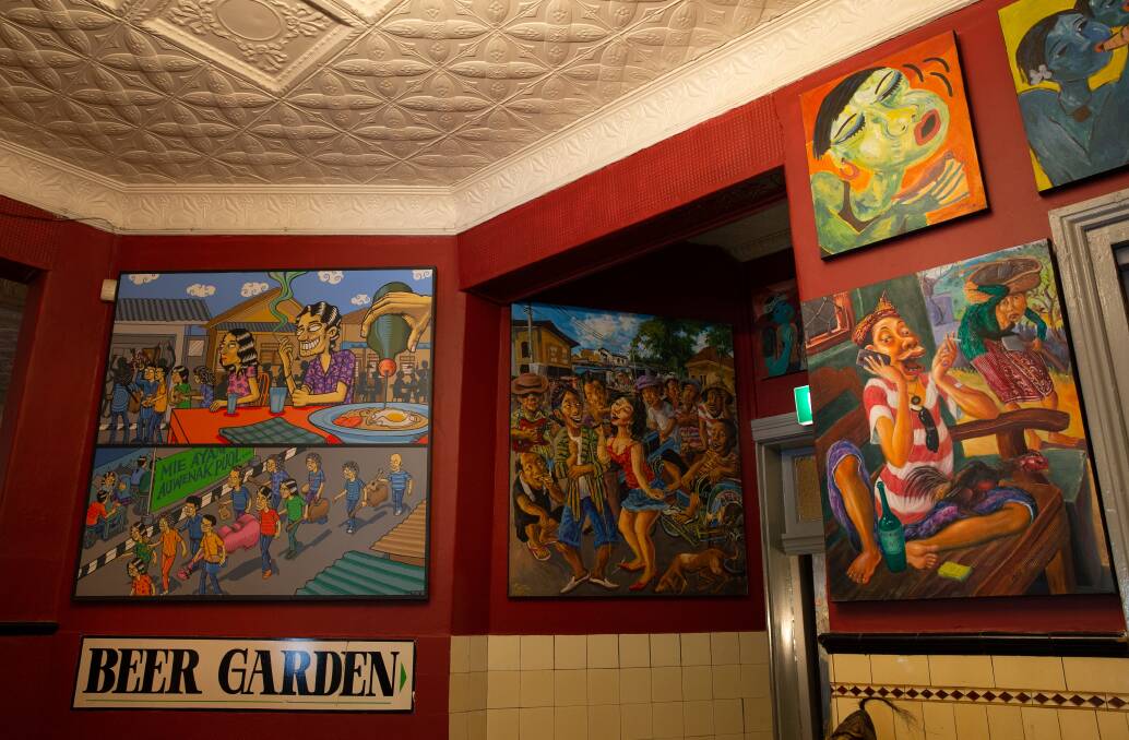 Paintings by Indonesian artists Faizin and Pudjiami line the front bar's walls.