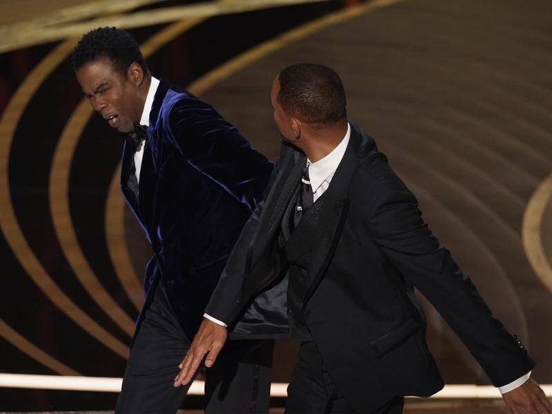 Will Smith slaps presenter Chris Rock on stage during the 94th Academy Awards in Los Angeles.