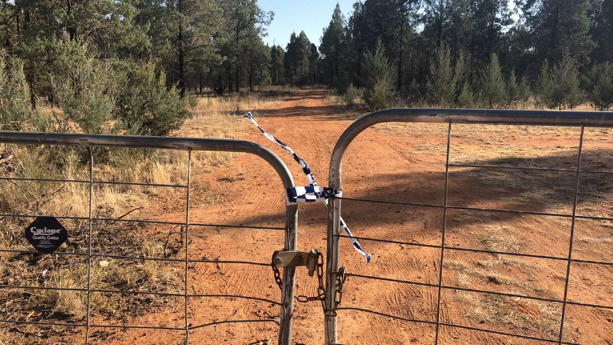 Police tape marks off the entrance to Lester State Forest, near Coolamon, on April 11, 2018. Picture: Rochelle Brown