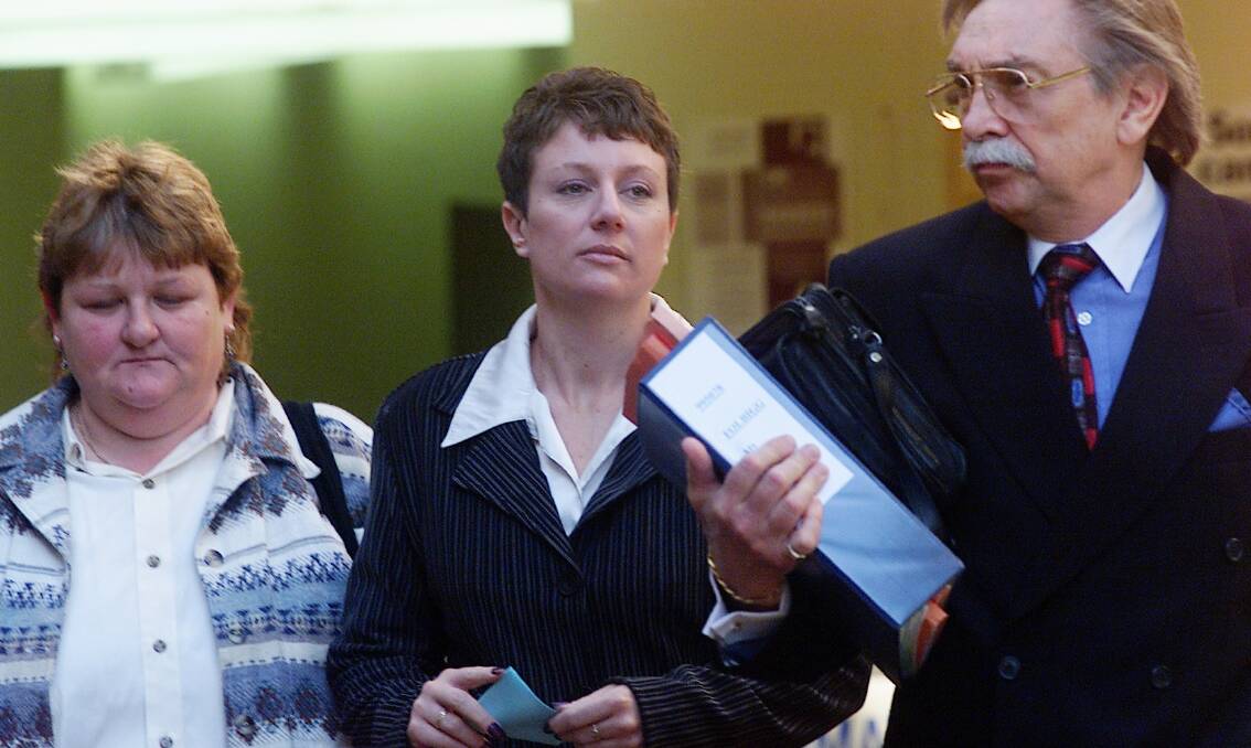Kathleen Folbigg, centre, leaving court at her original trial.