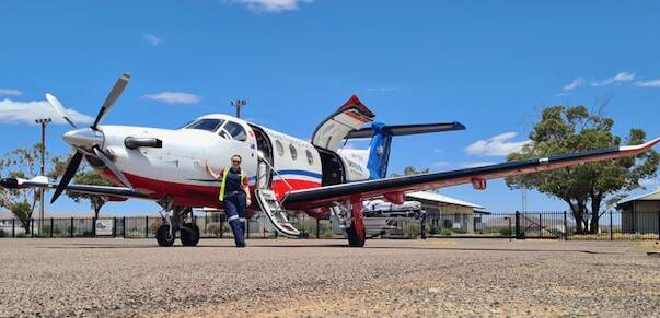 Laura Koerbin with the PC12 aircraft in Leigh Creek, SA. Picture supplied