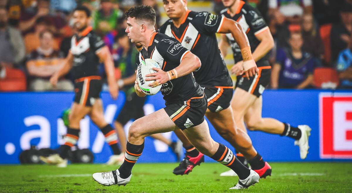CHARGE: Jock Madden goes for a run on debut. Photo: NRL Photos