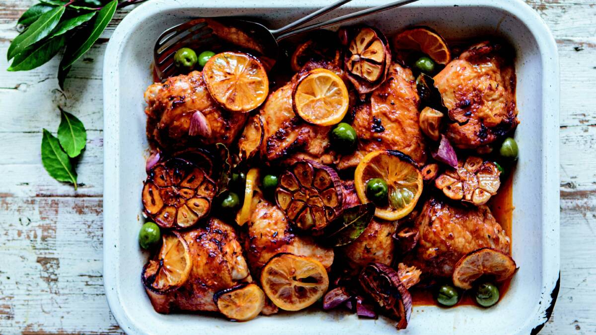 Roasted chicken thighs with lemon, smoked paprika and green olives. Picture by Rodney Weidland
