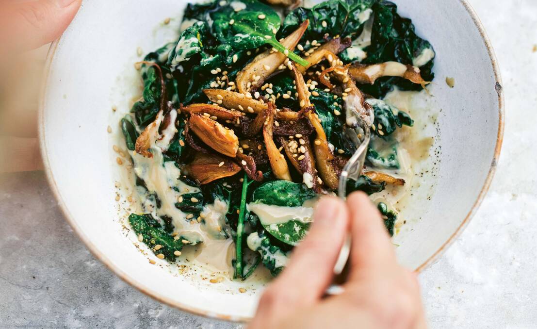 Charred breakfast kale with 'shrooms and ginger tahini. Picture: David Frenkiel
