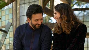 Shazad Latif, left and Lily James in What's Love Got To Do With It? Picture StudioCanal