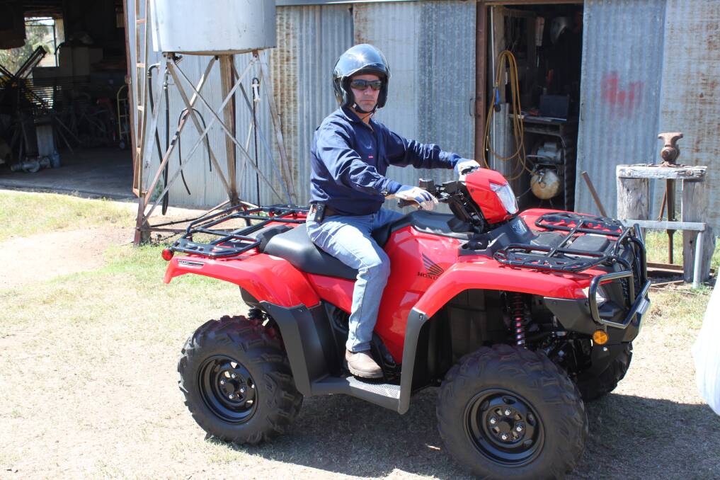COMPULSORY HELMETS: Honda says rather than making rollover protection devices compulsory on quad bikes the federal government should have mandated helmets and rider training and education.

