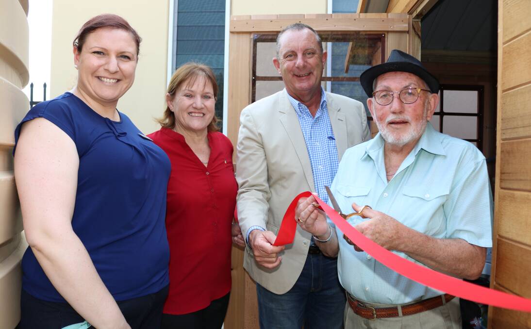 Singleton Youth Venue team leader Loren Arnott, Singleton mayor Cr Sue Moore, Upper Hunter MP Michael Johnsen and Dolly’s Charity Shop proprietor Gary Holland cut the ribbon on the first load of washing in the laundry