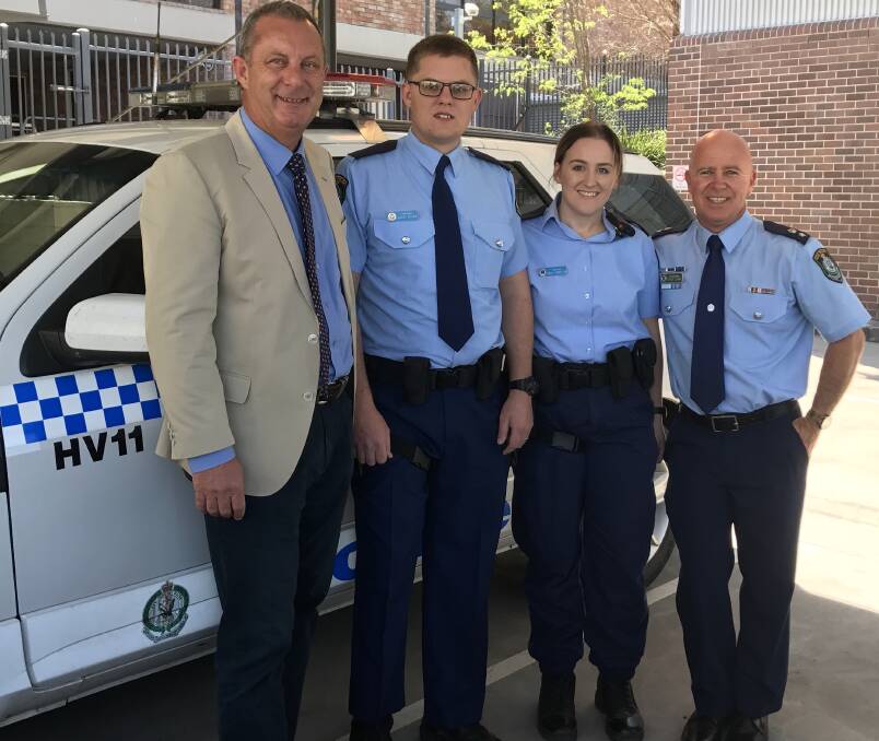 WELCOME: Upper Hunter MP Michael Johnsen and Hunter Valley Local Area Command Superintendent Steve Clarke with two of the new probationary constables.