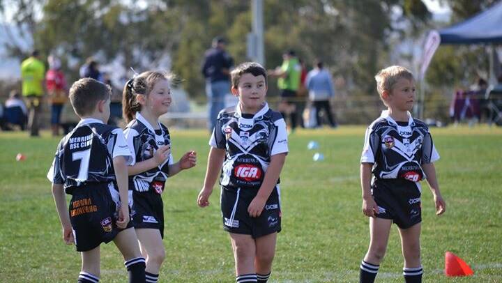 Young Merriwa Magpie Oscar Swan (centre), who is now in the top six of the nation-wide MyLeague Moment of the Year competition.
