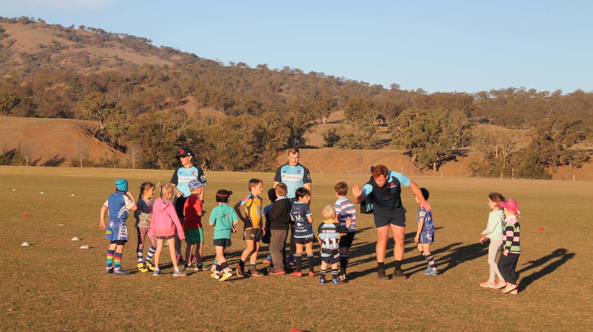 SPECIAL OPPORTUNITY: NSW Waratahs players at the Gundy Let's Tackle the Drought Together event. 