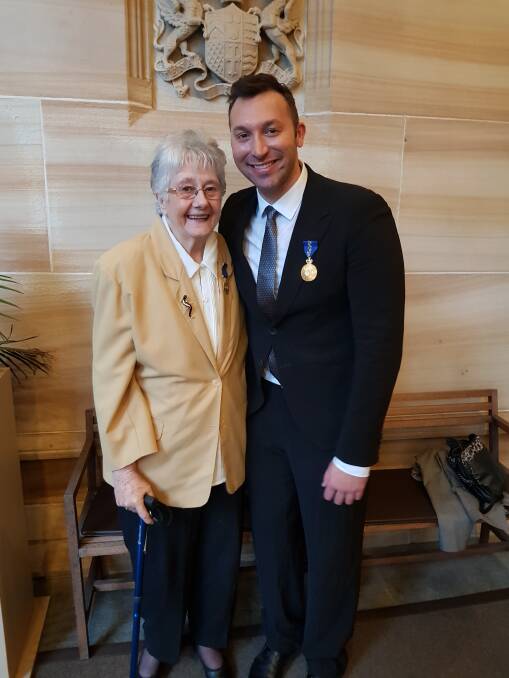 HONOURED: Aberdeen resident Marion Wilkins OAM with legendary swimmer Ian Thorpe at Government House last month.