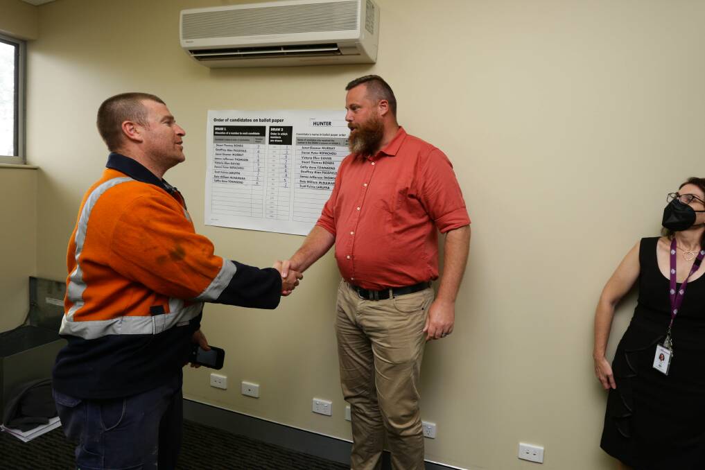 CAMPAIGN: Independent Stuart Bonds (left) and Labor's Dan Repacholi (right) at the ballot draw for the seat of Hunter on Friday, April 22. Picture: Jonathan Carroll
