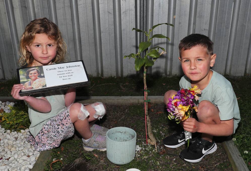 Maddison and Jack Moore have made a memorial garden for their mum Cassie at their Edgeworth home. Picture by Peter Lorimer