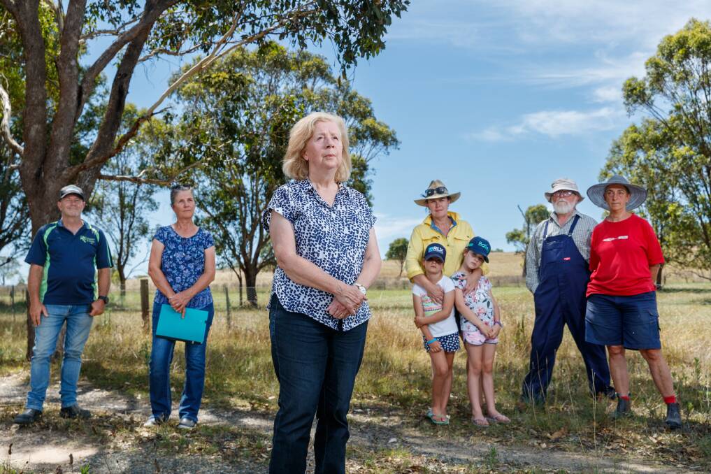 Hunter Gas Landholder Rights Alliance vice-president Anne McGowan (centre), with her neighbours at Reedy Creek near Singleton on Wednesday. Picture by Max Mason-Hubers 