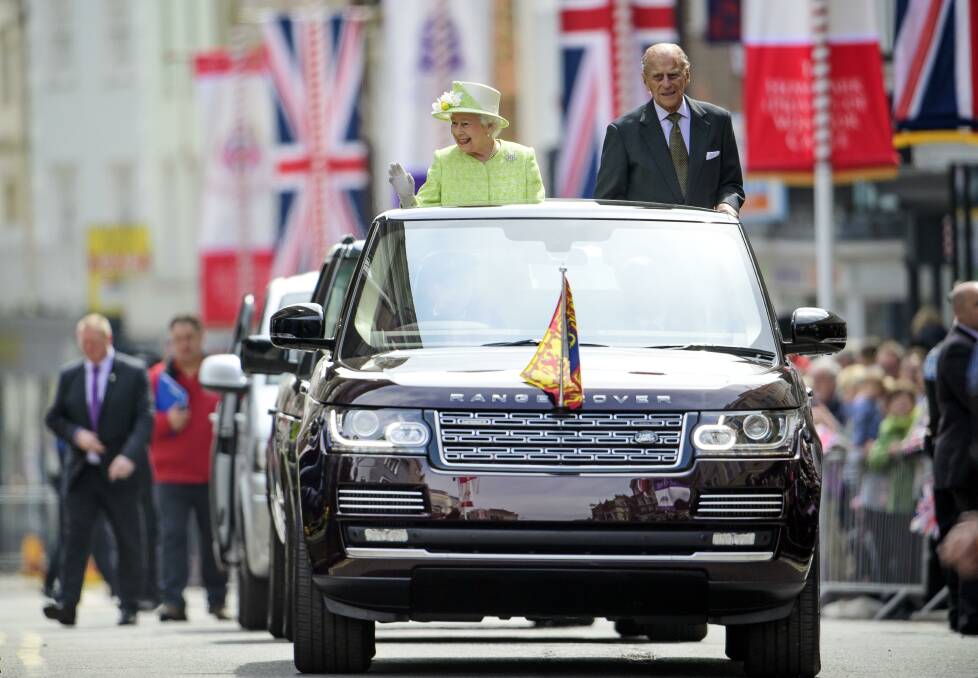 The Queen and Prince Philip in an open-topped Range Rover, on her 90th birthday. Picture supplied