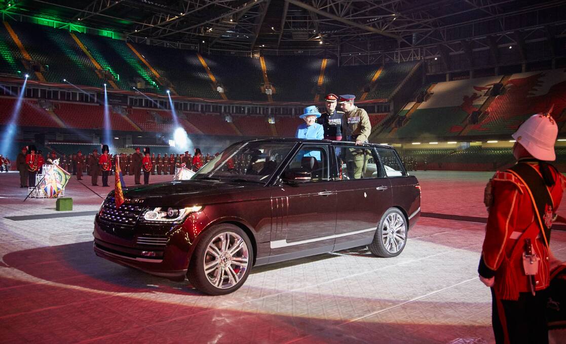 Range Rover and Land Rover built a number of special open-roofed State Review cars for The Queen, this hybrid model used the present New Colours to the Royal Welsh Regiment in Cardiff in 2015. Picture: Supplied