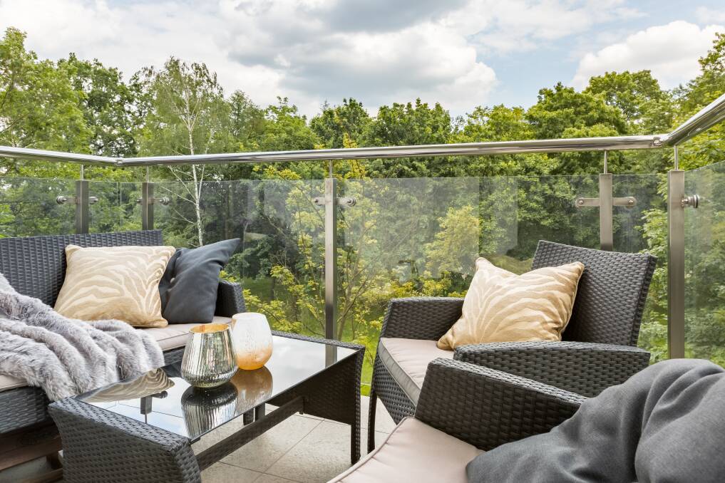 A BEAUTIFUL VIEW: Glass panelling can significantly improve the look and feel of your outdoor spaces. Photo: Shutterstock
