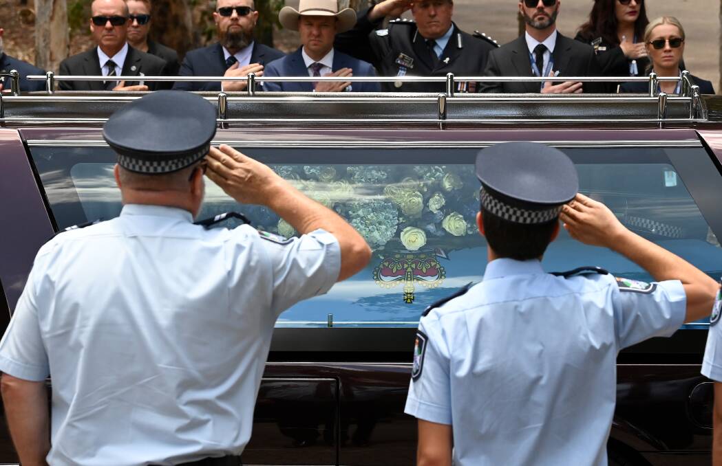 Police officers paid their respects to Constable Rachel McCrow and Constable Matthew Arnold who were killed in a shooting in Queensland last week. Picture Getty Images 