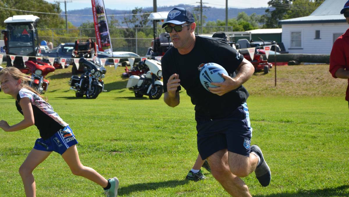 A team of “True Blues”, led by NSW State of Origin coach Brad Fittler, captivated league fans, young and old, at Scone Park last year when the Hogs For The Homeless Tour passed through.
