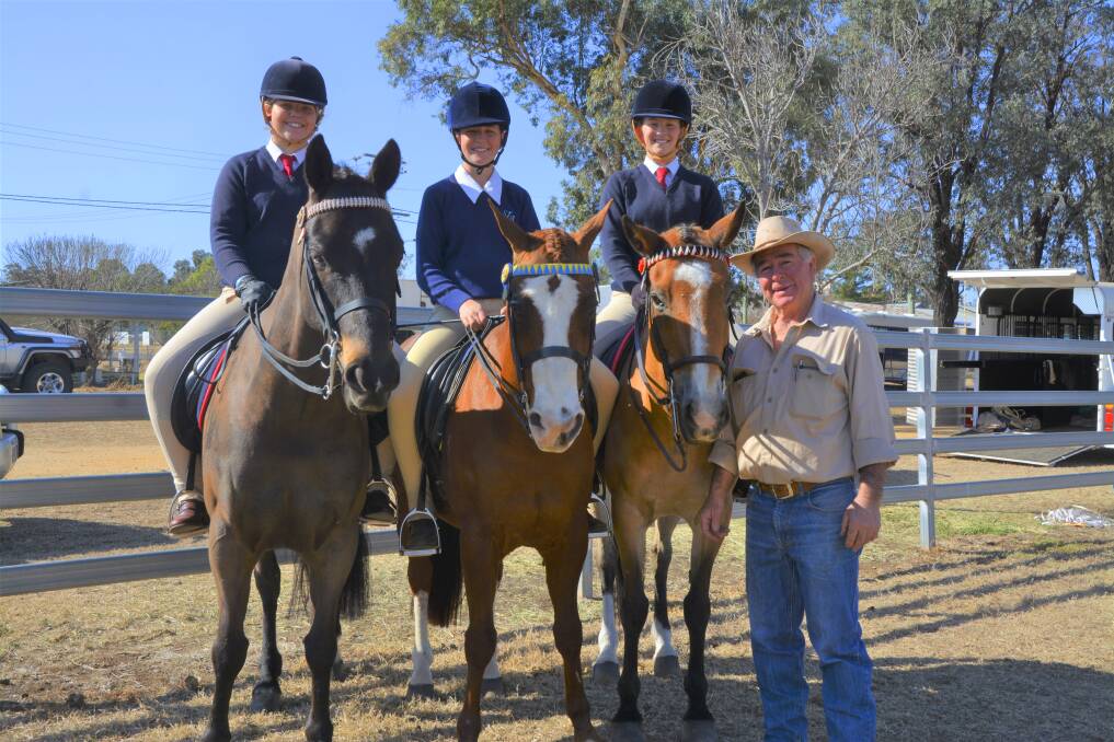 SADDLE UP: Show president Rob Tindall (right) with Nicole Martin, Emily Ninness and Annie Irwin who are looking forward to competing at the show this weekend. 